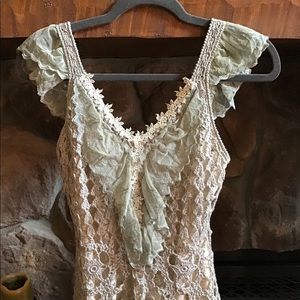 Beautiful top with crochet/lace details.
